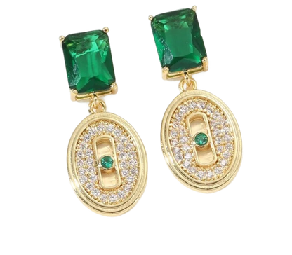 a pair of green and white earrings