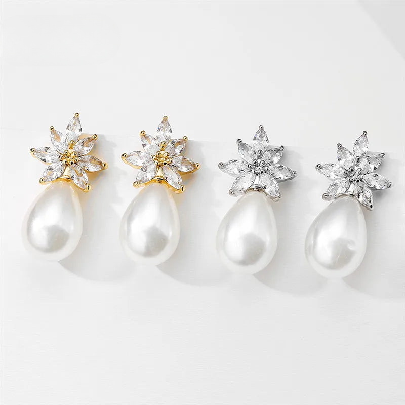 three pairs of pearl and diamond earrings