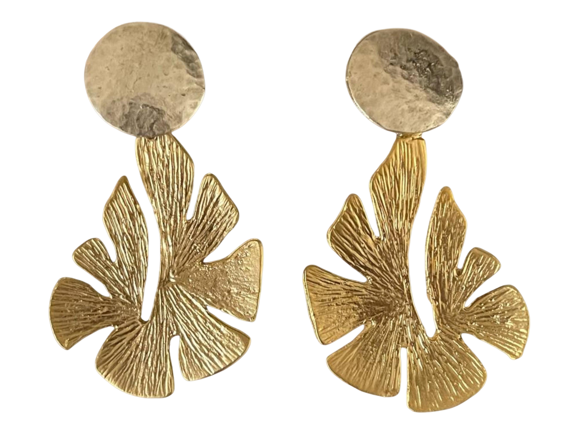 a pair of gold earrings with a flower design