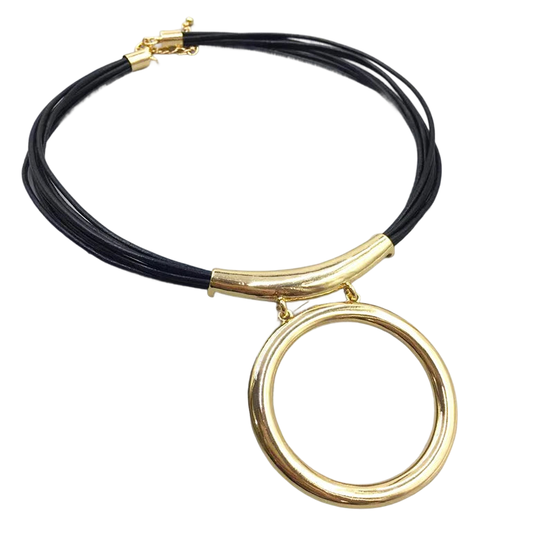 a black and gold necklace with two rings