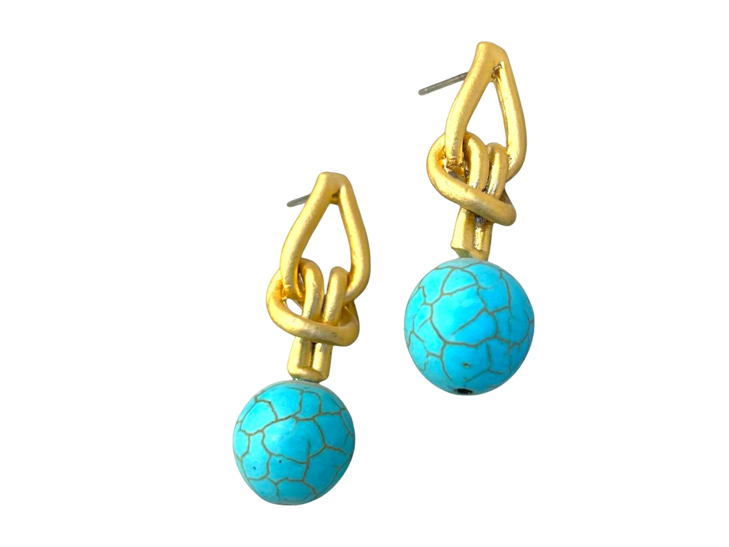 a pair of earrings with a ball on it