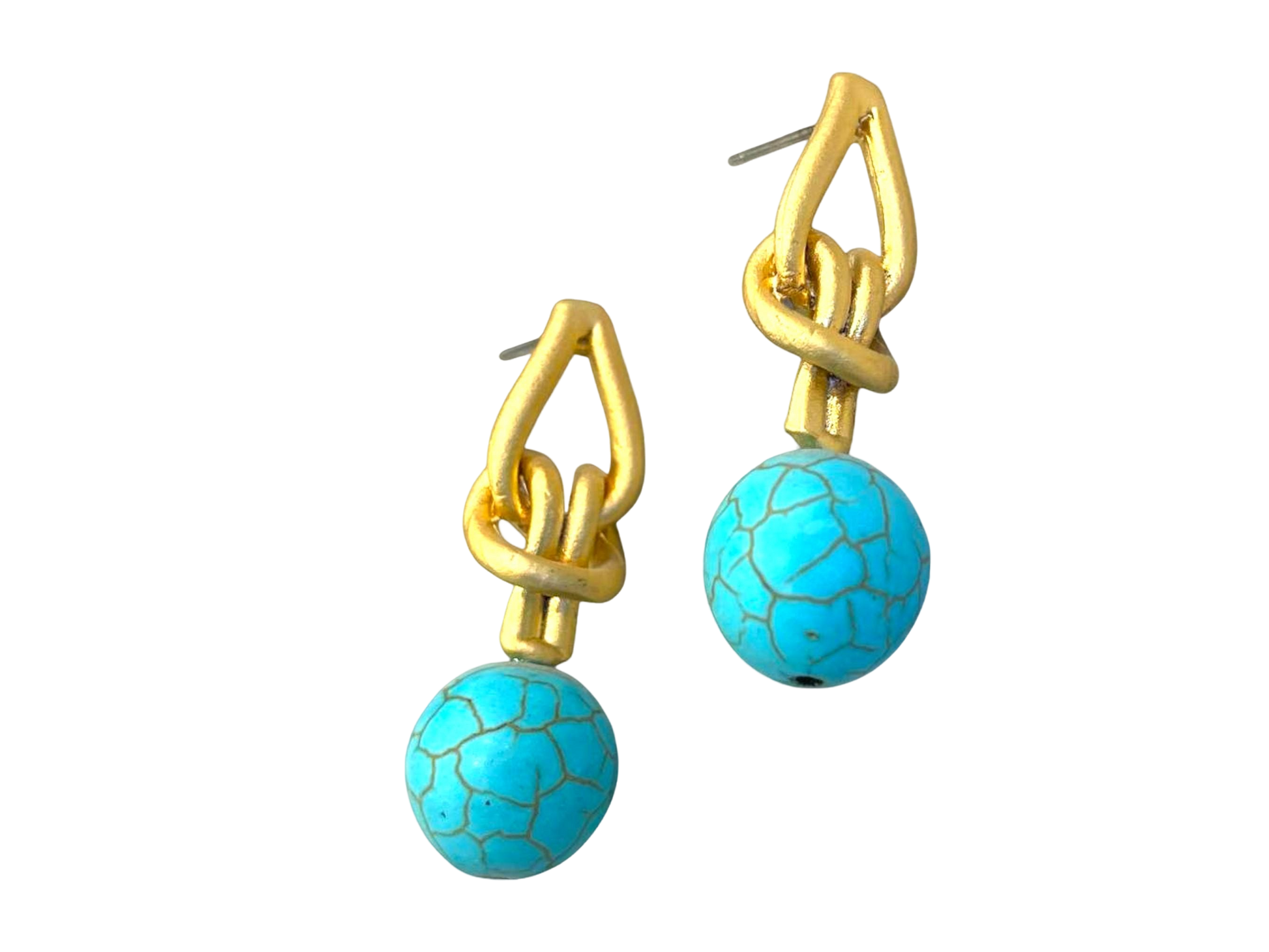 a pair of earrings with a ball on it