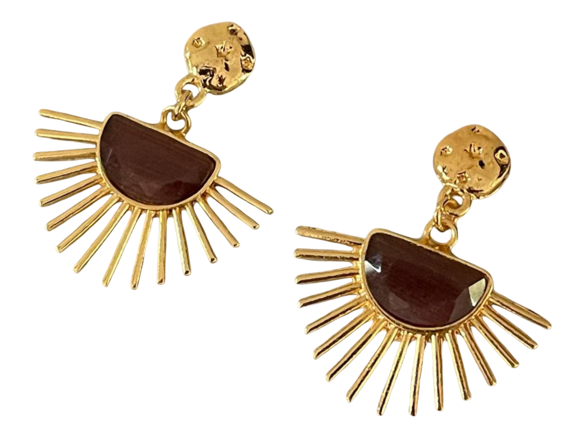 a pair of gold earrings with a brown stone