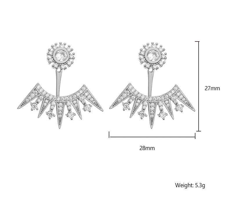 a pair of earrings with diamonds on them