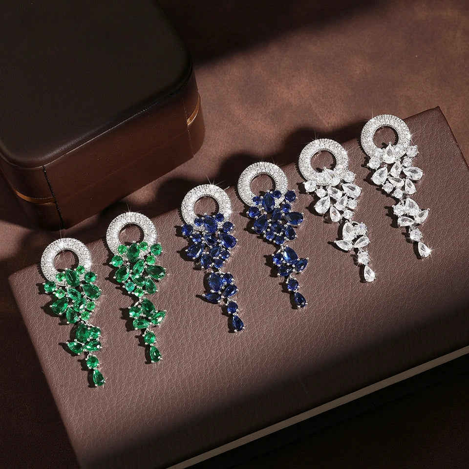 a group of brooches sitting on top of a table