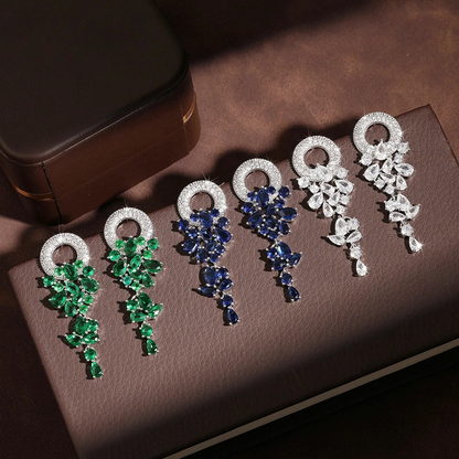 a group of brooches sitting on top of a table