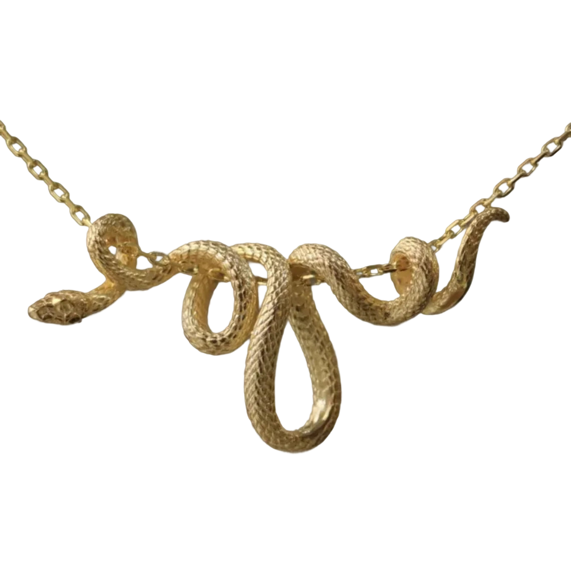 a gold snake necklace on a black background