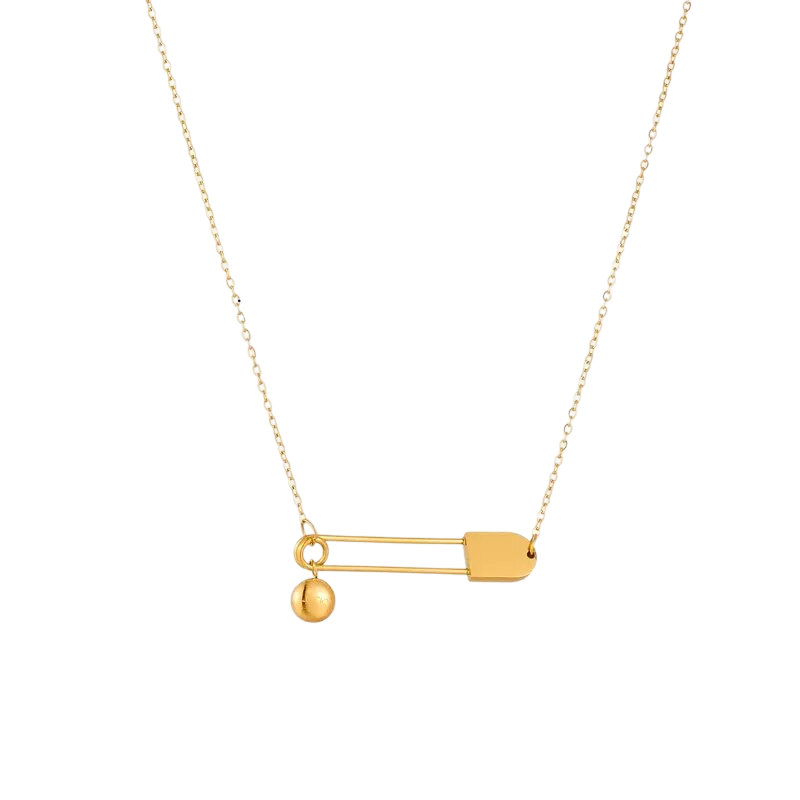 a gold necklace on a black background