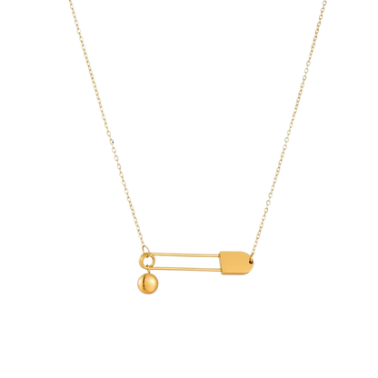 a gold necklace on a black background