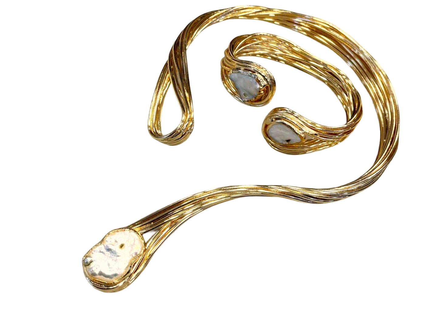 a gold necklace with a white stone on it