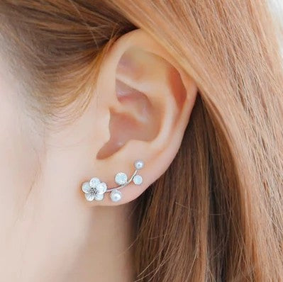 Elegant Crystal Flower Stud Earrings
 
 Add a touch of elegance to your outfit with these trendy crystal flower stud earrings. The irregular shape and intricate design make them a perfect accessory forGlam DuchessGlam DuchessElegant Crystal Flower Stud Earrings