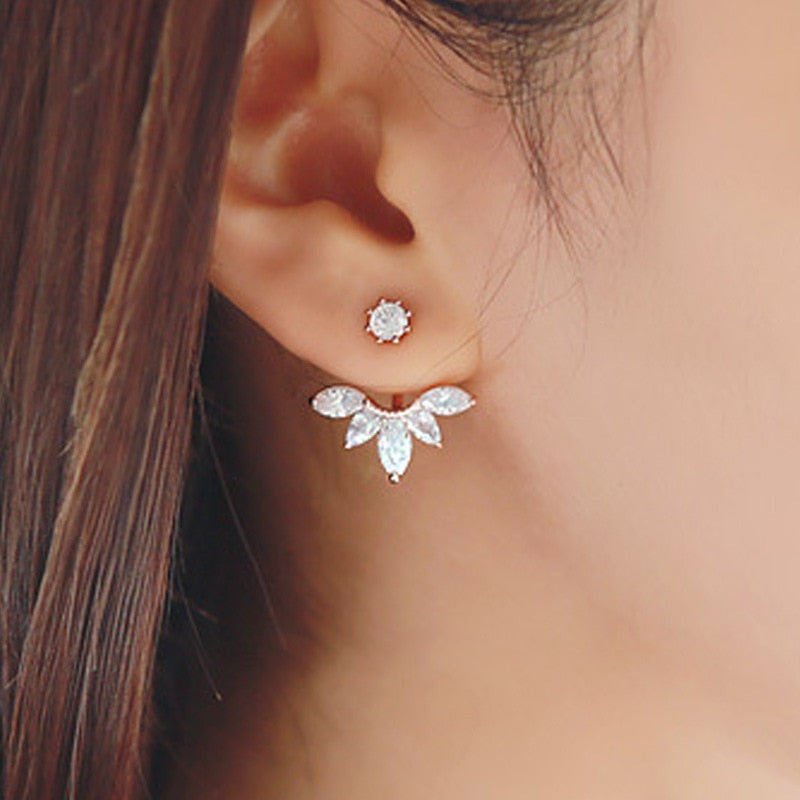 Elegant Crystal Flower Stud Earrings
 
 Add a touch of elegance to your outfit with these trendy crystal flower stud earrings. The irregular shape and intricate design make them a perfect accessory forGlam DuchessGlam DuchessElegant Crystal Flower Stud Earrings