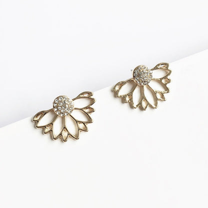 Elegant Crystal Flower Stud Earrings
 
 Add a touch of elegance to your outfit with these trendy crystal flower stud earrings. The irregular shape and intricate design make them a perfect accessory forGlam DuchessGlam DuchessElegant Crystal Flower Stud Earrings