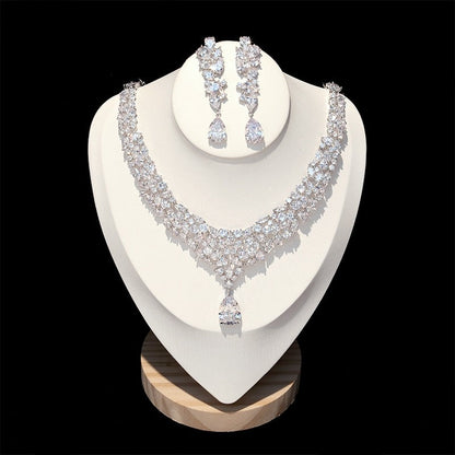 Exquisite Crystal Wedding Jewelry Set with Cubic Zirconia
 Make a Statement with Our Elegant Cubic Zirconia Wedding Jewelry Set
 Enhance your bridal attire or elevate your party look with this exquisite jewelry set. CrafteGlam DuchessGlam DuchessExquisite Crystal Wedding Jewelry Set