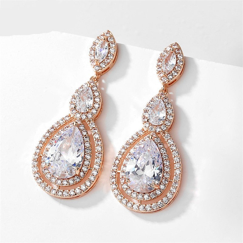 Waterdrop Cubic Zirconia Bridal Earrings
 
 Add a touch of elegance to your bridal ensemble with our Waterdrop Cubic Zirconia Bridal Earrings. These exquisite earrings feature:
 
 
Style: TRENDY
 
Stone FoGlam DuchessGlam DuchessWaterdrop Cubic Zirconia Bridal Earrings