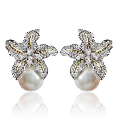 Floral Pearl Stud Earrings
 
 Enhance your style with these trendy Flower Pearl Stud Earrings. The geometric shape and simulated-pearl design add a touch of elegance to any outfit.
 
 
MateriGlam DuchessGlam DuchessFloral Pearl Stud Earrings