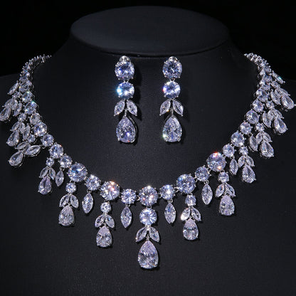 Elegant Cubic Zirconia Geometric Jewelry Set
 
 Enhance your ensemble with our stunning Cubic Zirconia Wedding Necklace Earrings Jewelry Set. This trendy set features:
 
 Exquisite geometric design
 Perfect foGlam DuchessGlam DuchessElegant Cubic Zirconia Geometric Jewelry Set