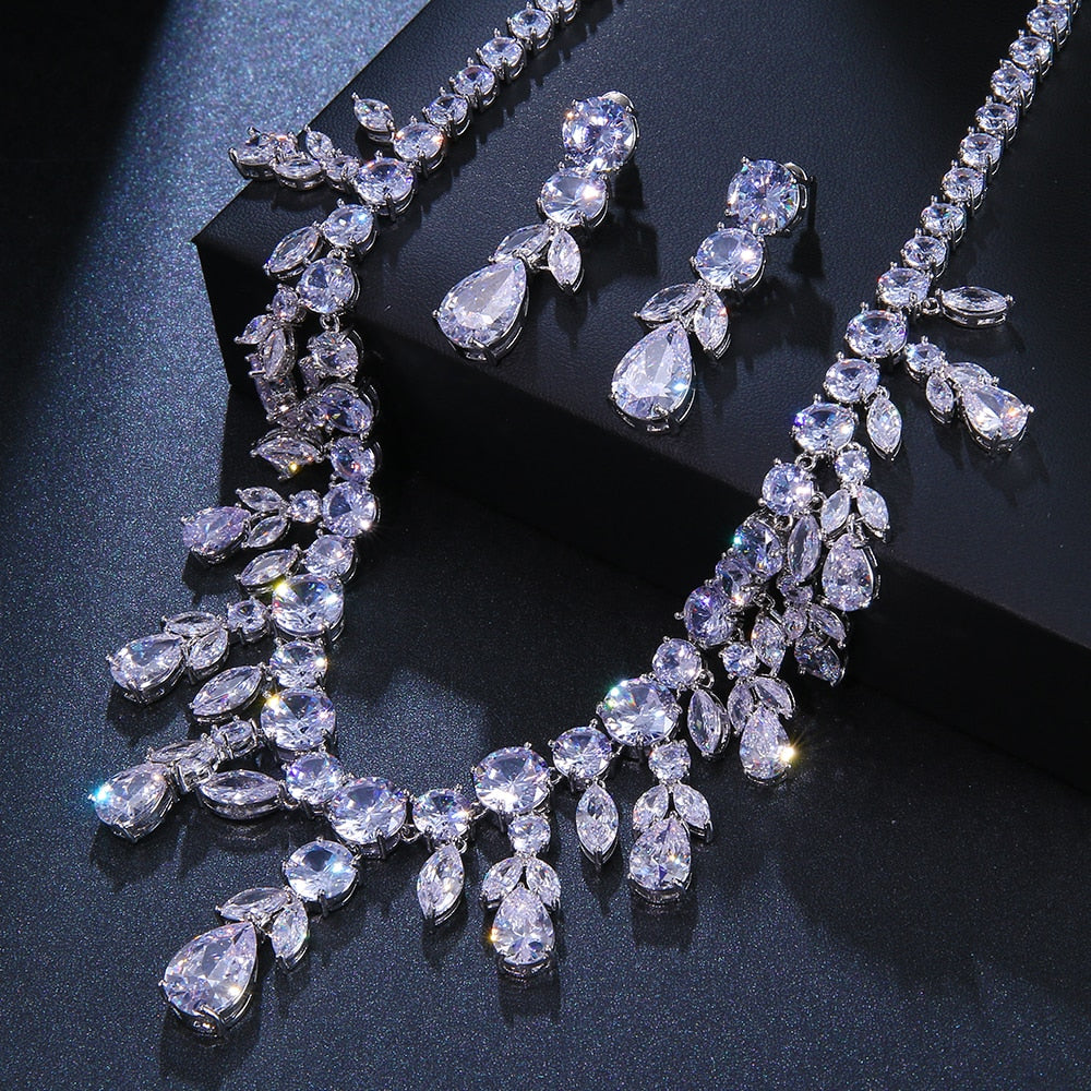 Elegant Geometric Wedding Jewelry Set with Cubic Zirconia
 Make a Statement with our Cubic Zircon Wedding Necklace Earrings
 Step into the spotlight with our trendy and elegant cubic zirconia wedding necklace and earrings Glam DuchessGlam DuchessElegant Geometric Wedding Jewelry Set