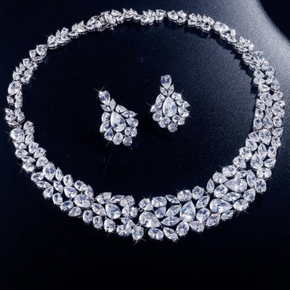 Exquisite Cubic Zirconia Wedding Jewelry Set

 Elegant Cubic Zirconia Bridal Necklace Earrings Set
 Get ready to dazzle on your special day with this exquisite Cubic Zirconia bridal necklace and earrings set. Glam DuchessGlam DuchessExquisite Cubic Zirconia Wedding Jewelry Set