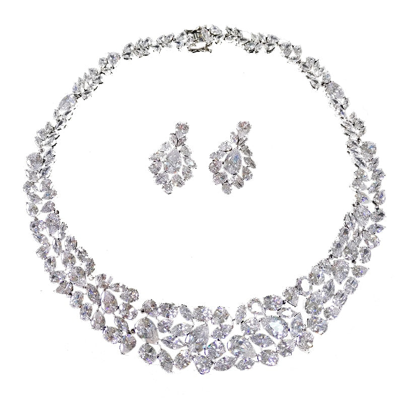 Exquisite Cubic Zirconia Wedding Jewelry Set

 Elegant Cubic Zirconia Bridal Necklace Earrings Set
 Get ready to dazzle on your special day with this exquisite Cubic Zirconia bridal necklace and earrings set. Glam DuchessGlam DuchessExquisite Cubic Zirconia Wedding Jewelry Set