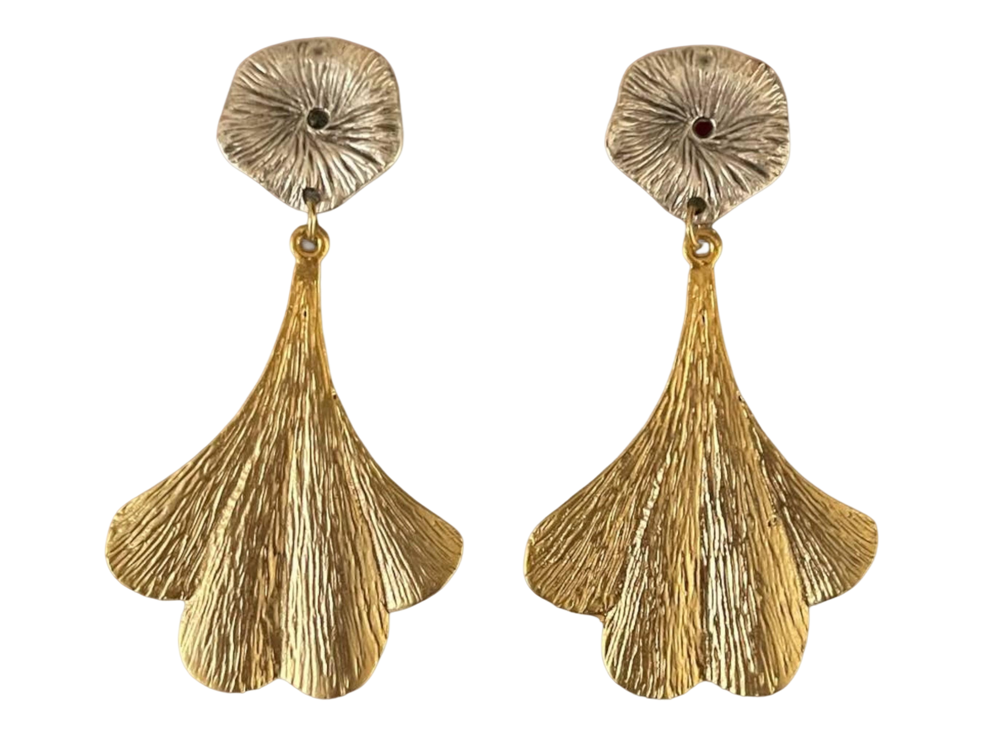 a pair of gold earrings with large fan shaped petals