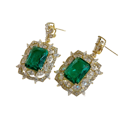 Radiant Green Emerald Geometric Drop Earrings
 
 Discover the elegance and trendiness of our Green Emerald Cubic Zirconia Earrings. Crafted from high-quality copper alloy and adorned with radiant cubic zirconiaGlam DuchessGlam DuchessRadiant Green Emerald Geometric Drop Earrings