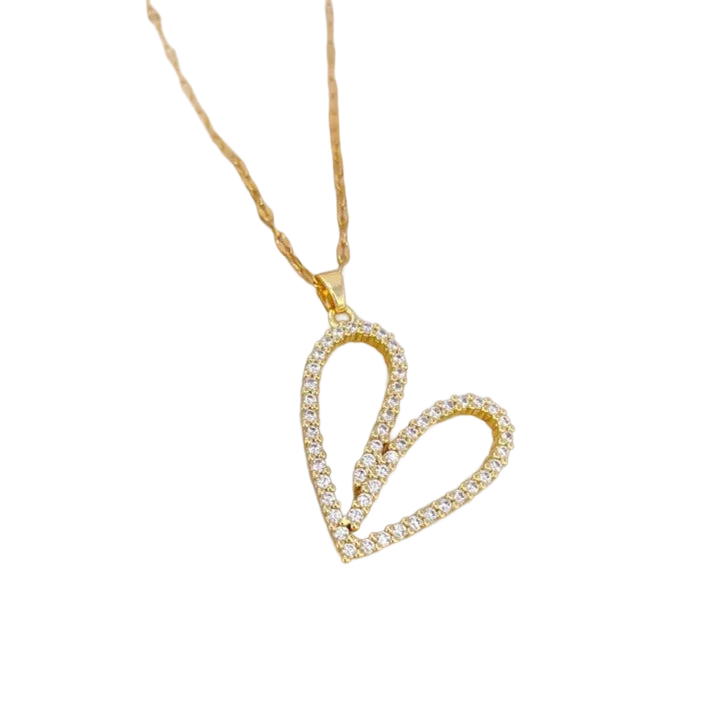 a diamond heart pendant on a gold chain