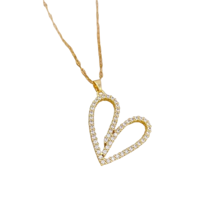 a diamond heart pendant on a gold chain