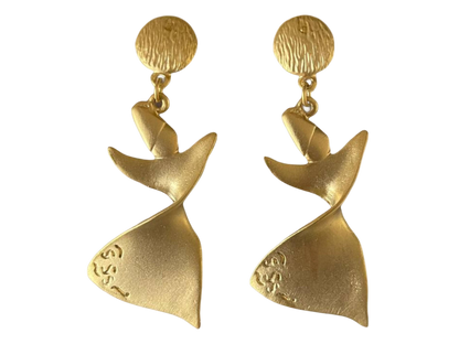 a pair of gold earrings with a bird design